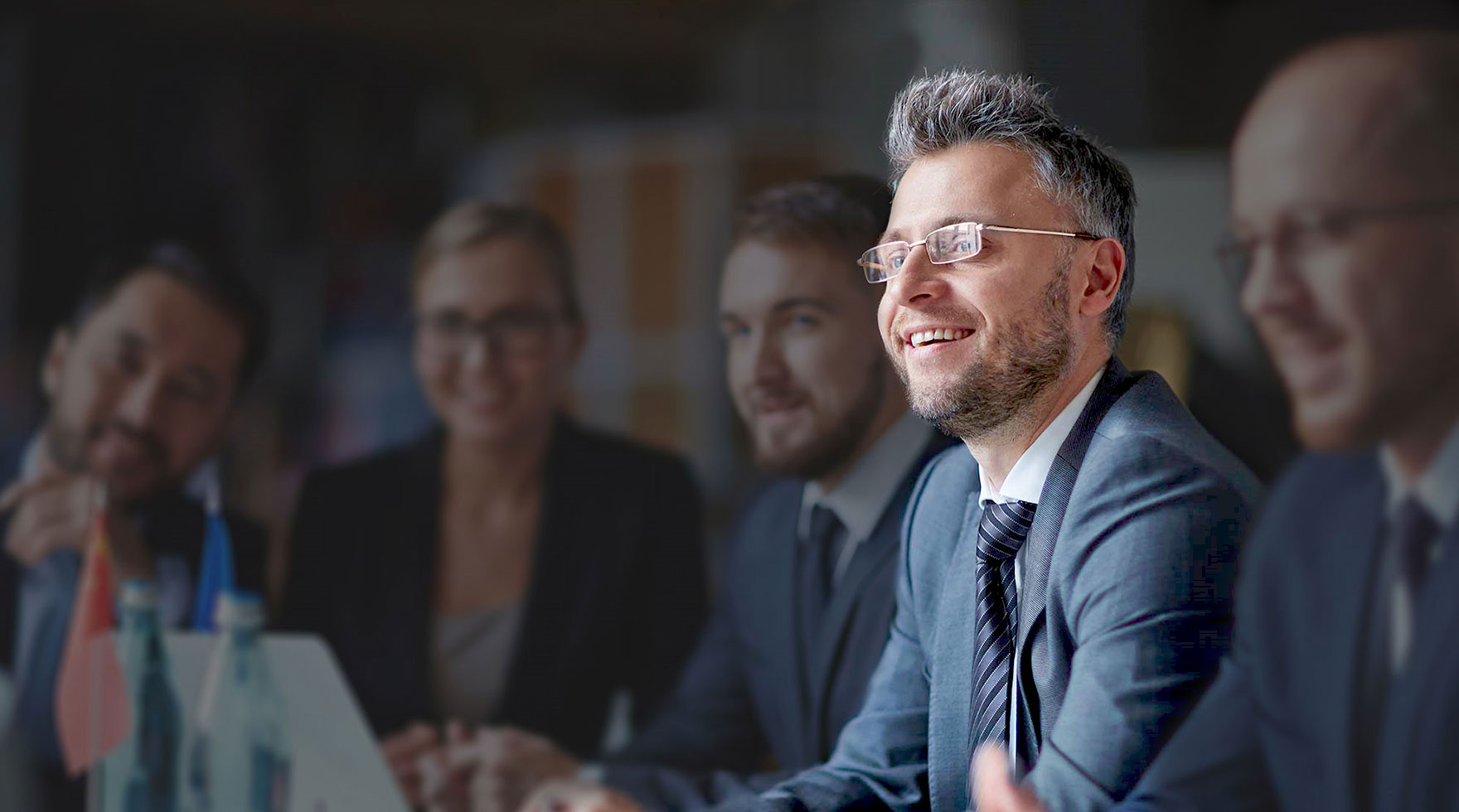 Image shows people in a meeting